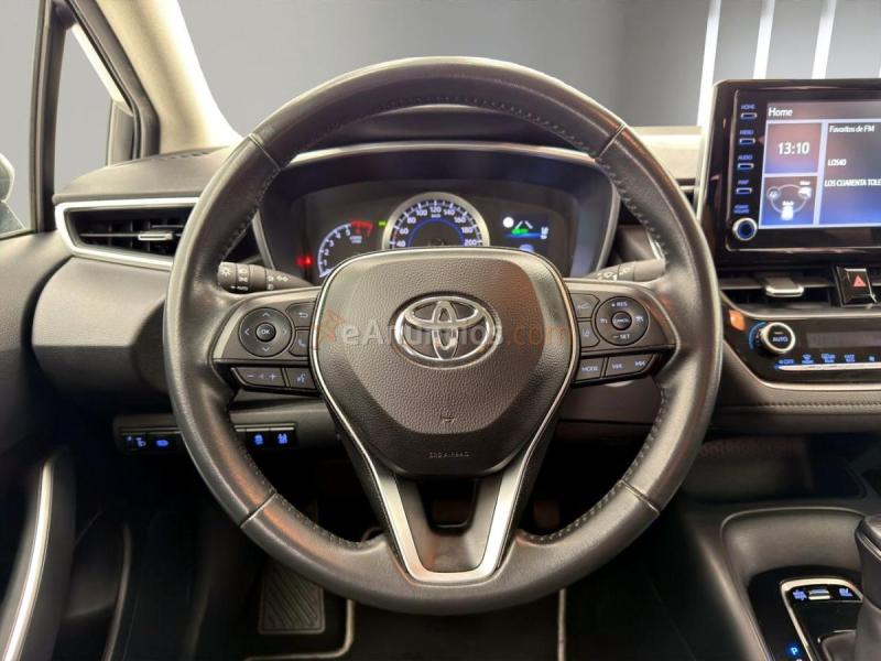Toyota Corolla 1.8 125H BUSINESS E-CVT SEDAN